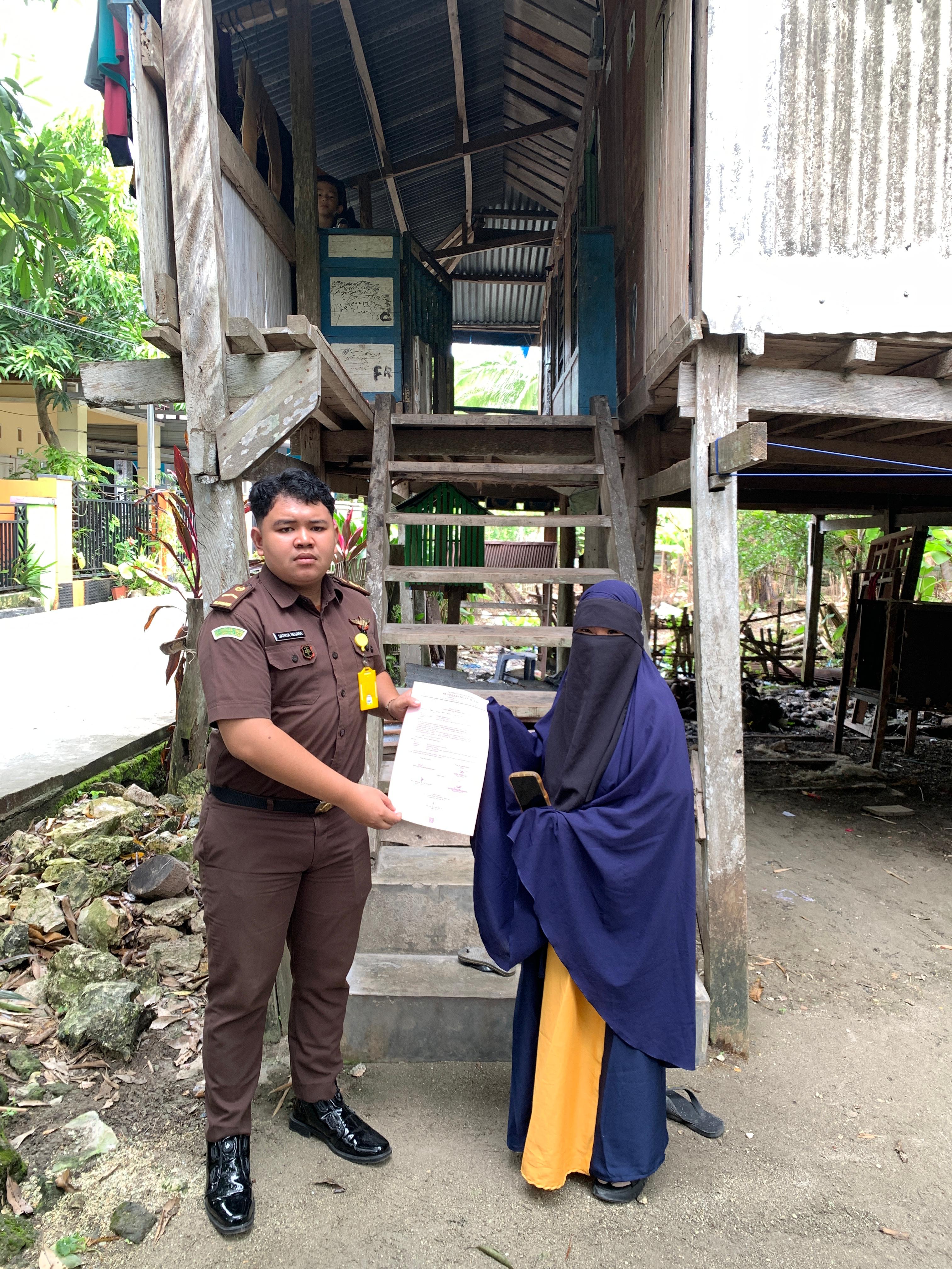 Layanan Program Pengantaran Barang Bukti Gratis PRAKTIS berupa 1 satu unit handphone